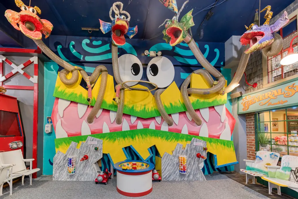 Children sliding down the indoor slides